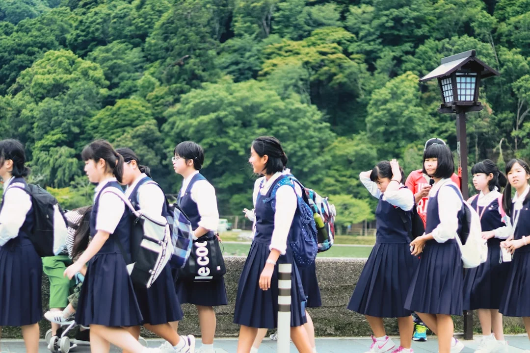 Male student wearing premium uniform